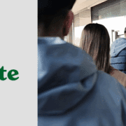 People standing in line at ATM