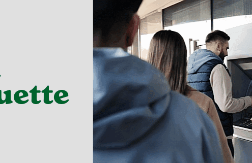People standing in line at ATM