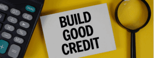 Calculator and magnifying glass on a yellow background with a sign that reads Build Good Credit.