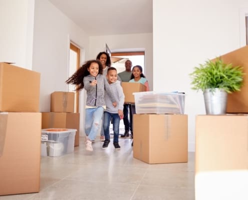 African American family moving into a new home.